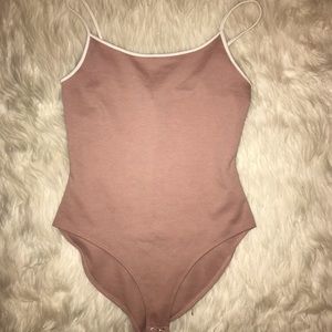 Mauve and white bodysuit